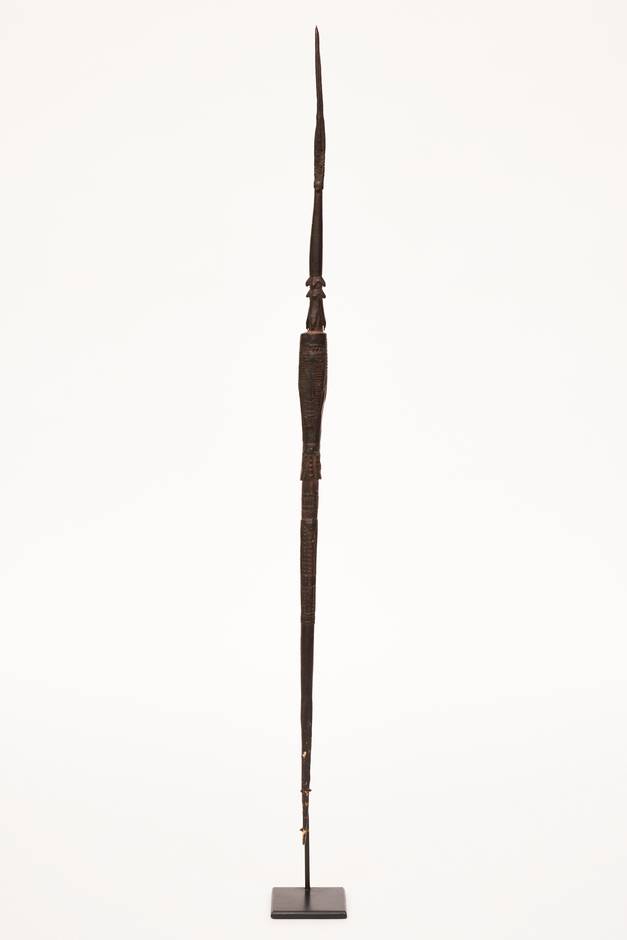 A rare Torres Strait Islands sculptural arrow of a male ancestor figure, 19th century